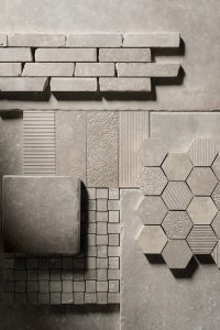 Carrier du Kronos represents the innovative character of the company, through the combination of stone and concrete, to achieve the perfect synthesis between the green philosophy and the metropolitan trend of modern living.